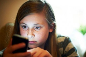 teen girl on smartphone
