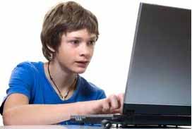 teen boy on computre