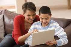 mom with her son on the computer