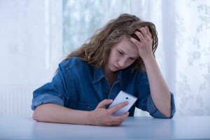 cyberbullied teen girl