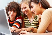 Teens online using internet. Online Safety Matters.